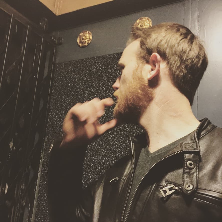 Garrett in a leather jacket